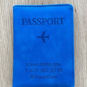 Blue Passport Cover with Embossed Travel Graphics